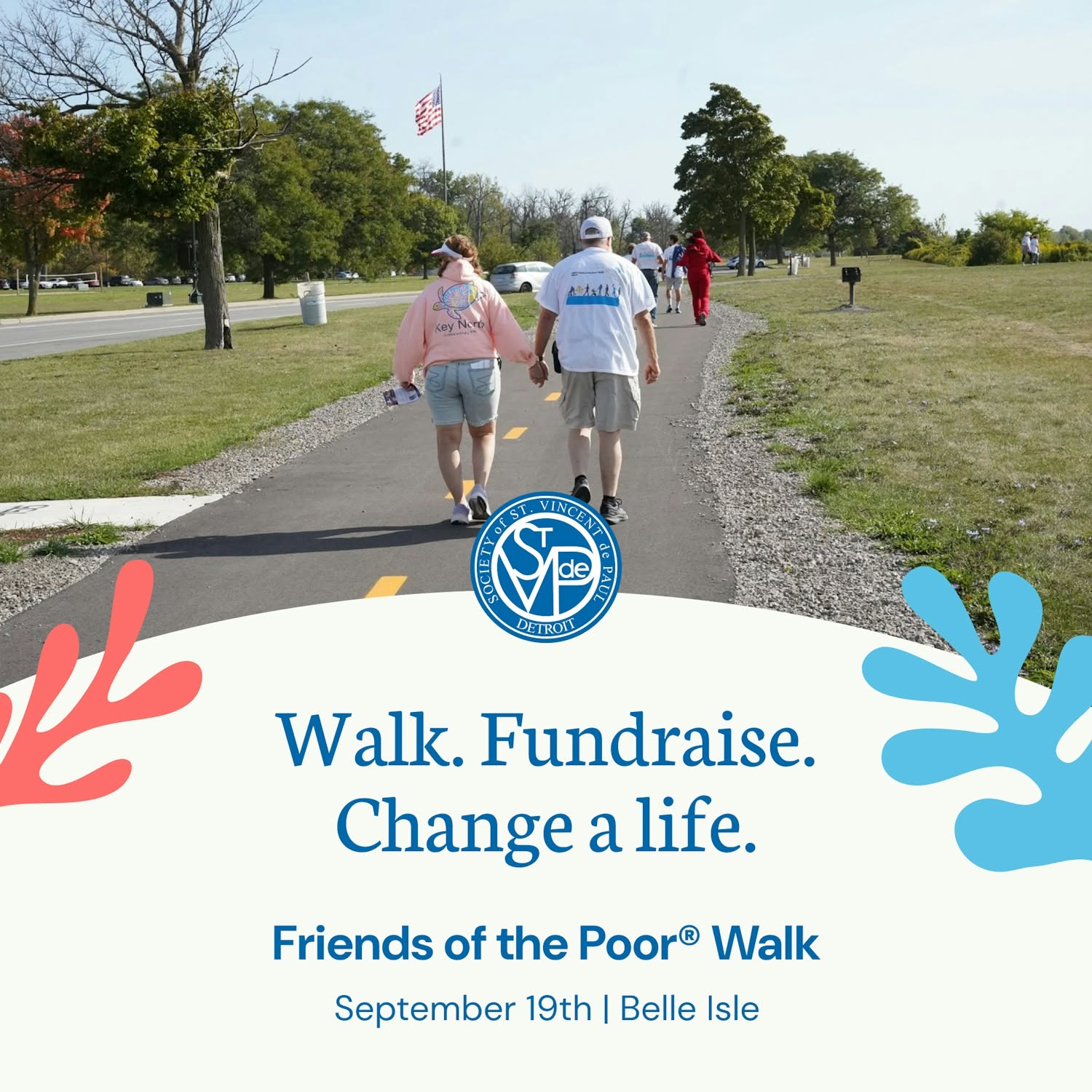 Photo of couple walking in the SVdP Friends of the Poor Walk. Walk. Fundraise. Change a life.